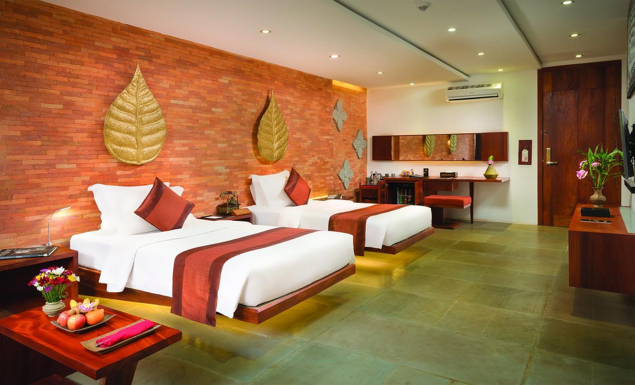 Golden Temple Residence Siem Reap Bagian luar foto Deluxe Room