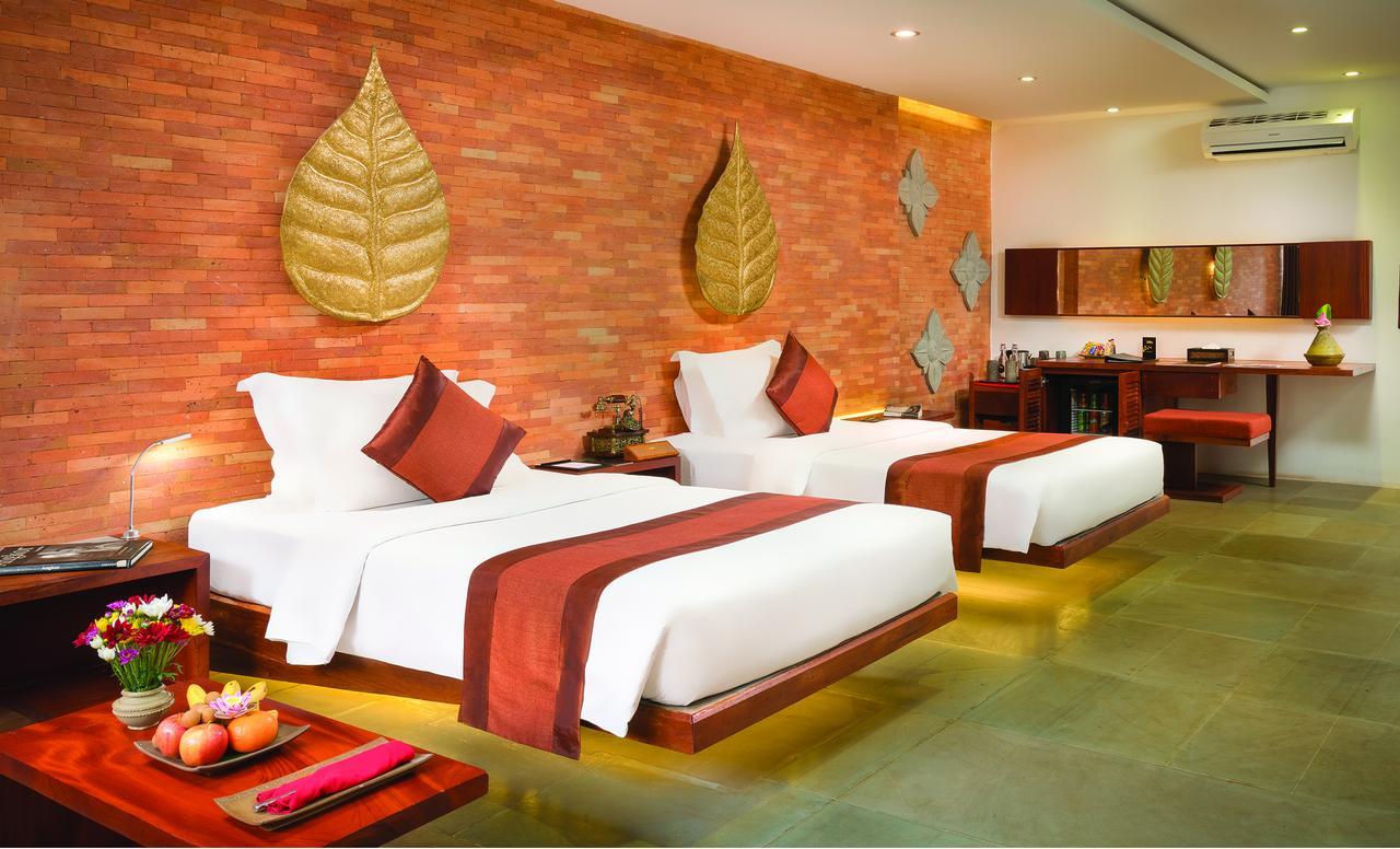 Golden Temple Residence Siem Reap Bagian luar foto Deluxe Room
